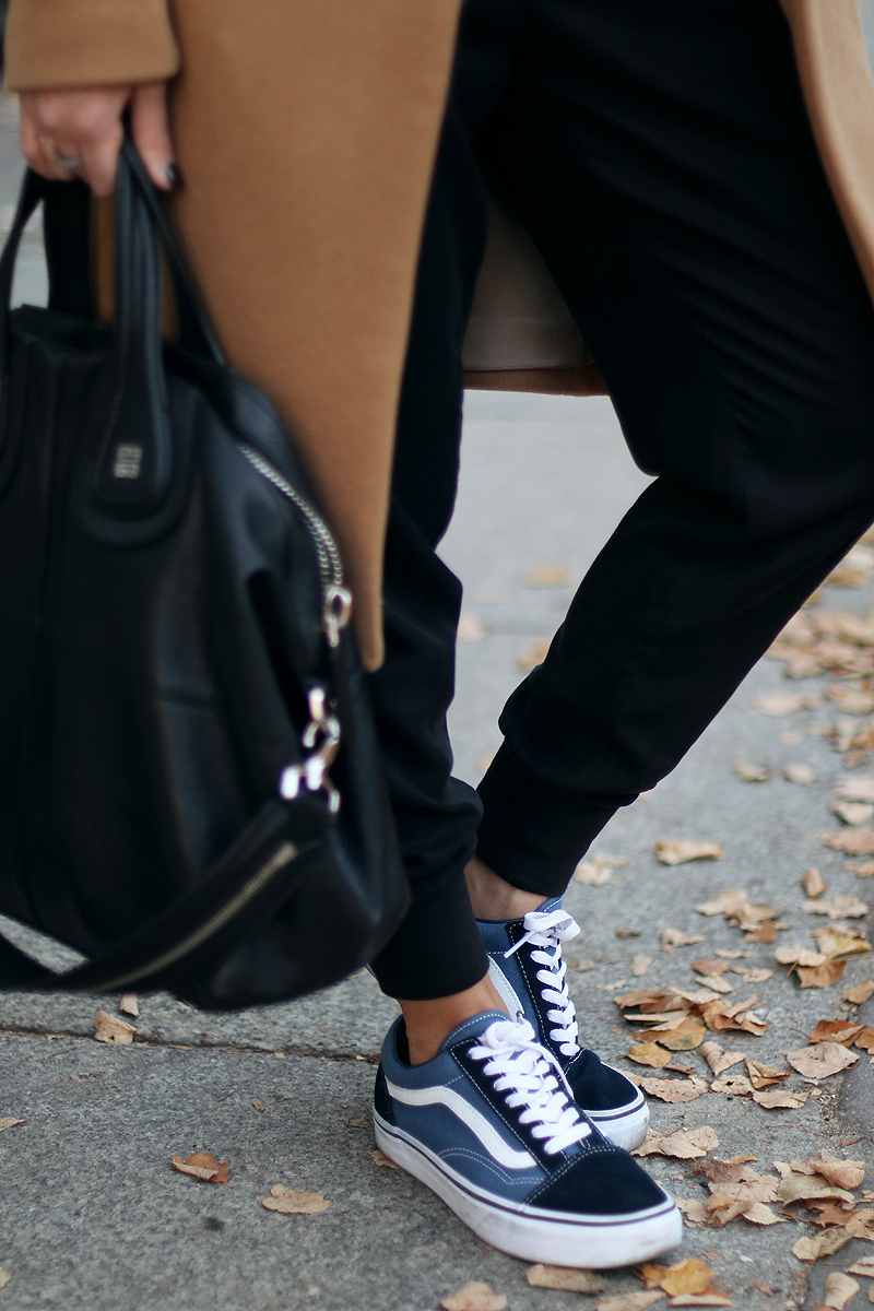 camel coat in a sporty ensemble