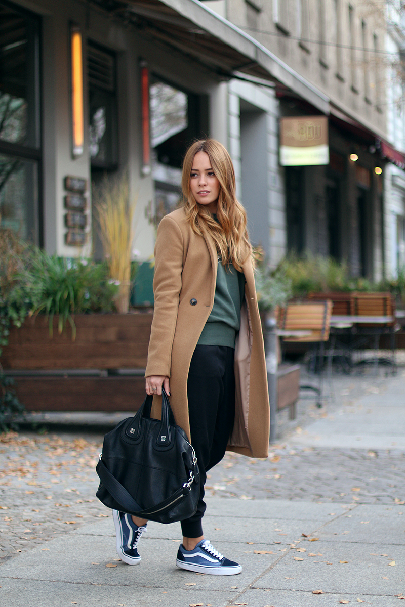 camel coat in a sporty ensemble