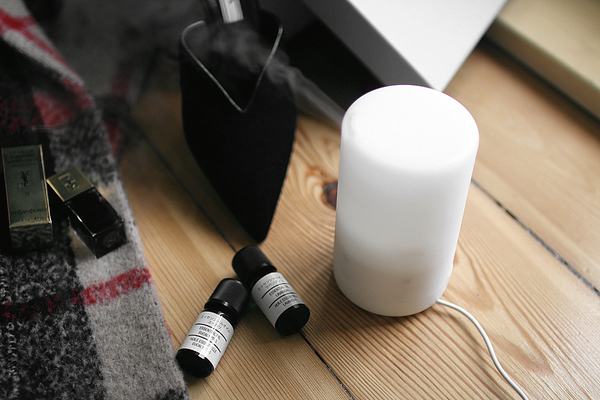 Muji Aroma Diffusor with eucalyptus and lavender, Zara checked wool coat, green white roses, Yves Saint Laurent La Laque Couture Nr. 73 Noir Over Noir für black nails Prada suede mules.