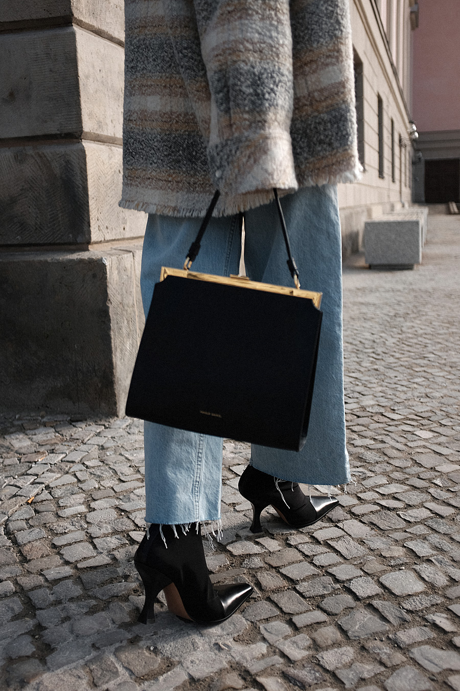 Outfit: Cable Knit and Cropped Flared Denim. Desi is wearing: Céline Madame Boots, Céline Eva sunglasses, Mansur Gavriel Elegant bag, Cropped flared denim jeans, checked wool-blend bouclé shirt, cable knit jumper