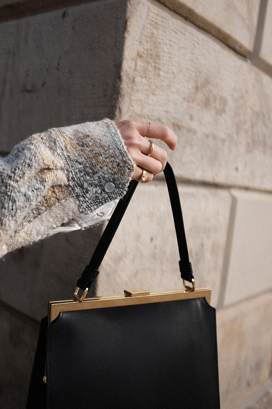 Outfit: Cable Knit and Cropped Flared Denim. Desi is wearing: Céline Madame Boots, Céline Eva sunglasses, Mansur Gavriel Elegant bag, Cropped flared denim jeans, checked wool-blend bouclé shirt, cable knit jumper