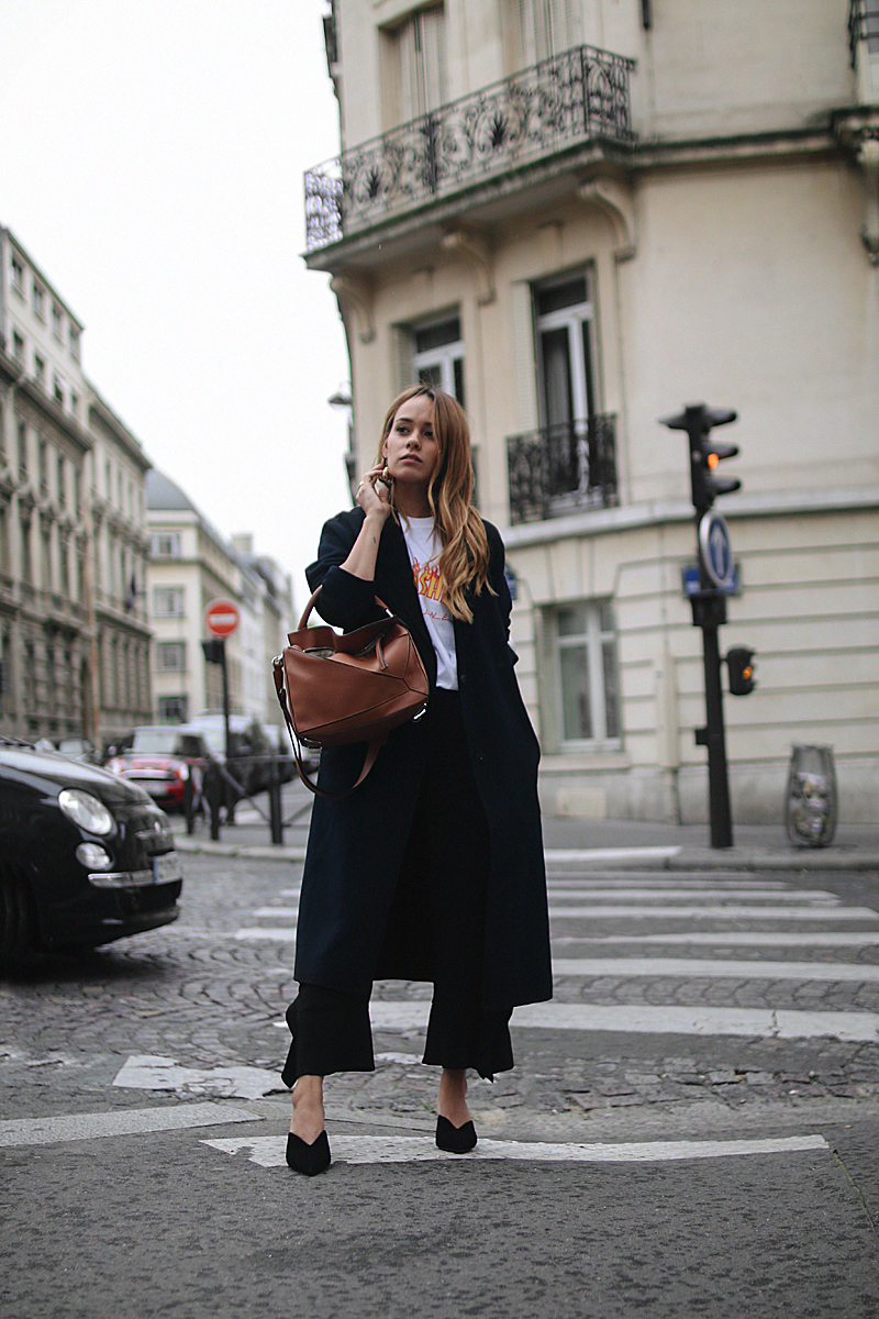 Outfit: With Frills and Mules in Paris. Desi is wearing Prada mules, Loewe bag, Thrasher shirt, Zara frill pants, H&M earrings
