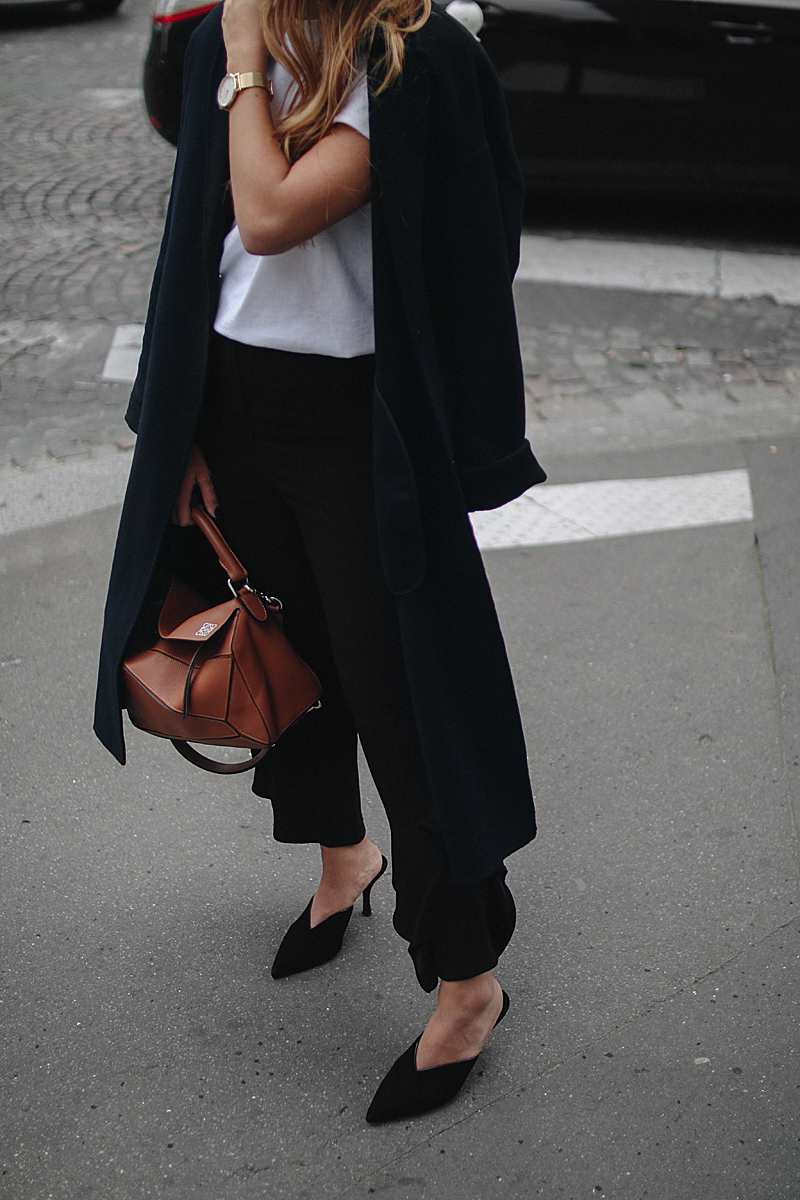 Outfit: With Frills and Mules in Paris. Desi is wearing Prada mules, Loewe bag, Thrasher shirt, Zara frill pants, H&M earrings