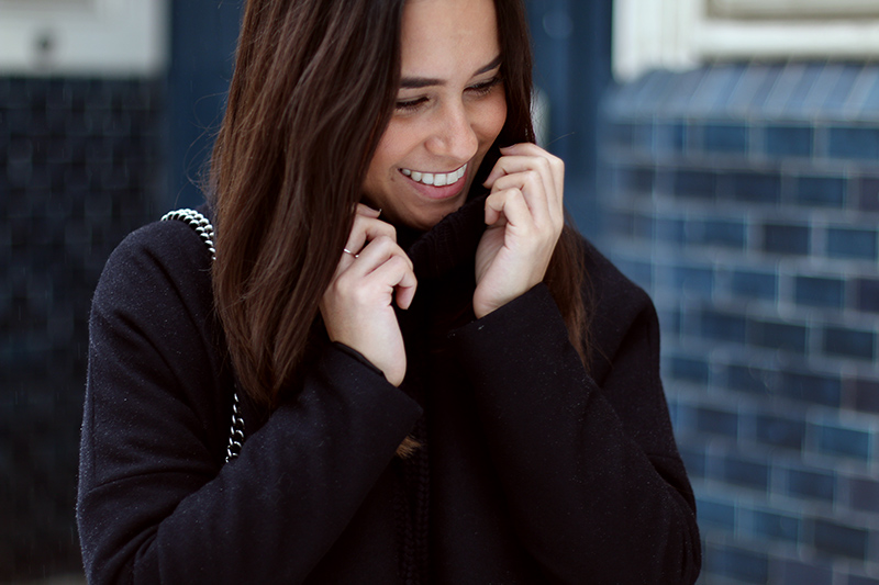Nisi is wearing: Gucci Dionysus Bag, Isabel Marant Nowles Boots, Midi silk dress, wool coat and cropped turtleneck sweater