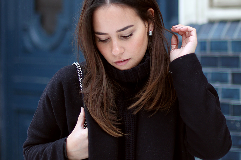 Nisi is wearing: Gucci Dionysus Bag, Isabel Marant Nowles Boots, Midi silk dress, wool coat and cropped turtleneck sweater