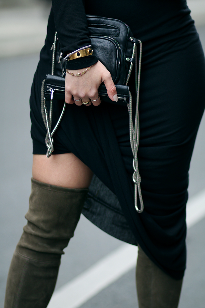 How to style overknees: Desi is wearing Stuart Weitzman Overknees, asymmetric draped dress and Alexander Wang Brenda Camera Bag