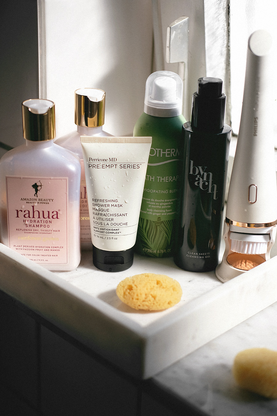 What's in my Shower - Bathroom Beauty Products: Rahua Hydration shampoo & conditioner, Perricone MD Refreshing shower mask, Biotherm, Bath Therapy Invigorating shower foam, Clean Sheets Cleansing gel Bynacht, Philips VisaPure, Cowshed Wild Cow Bath and massage oil, Diptyque candles, TANGENT GC Oud Organic soap