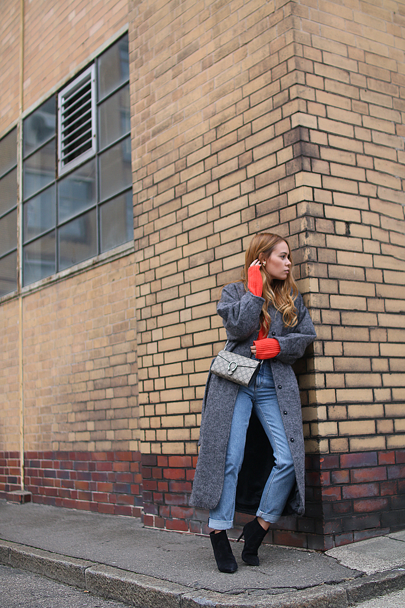 Fashion Essentials for Fall: Gucci Dionysus GG Supreme Mini bag, Saint Laurent ankle boots, Wool coat, Mom jeans, Red knit sweater