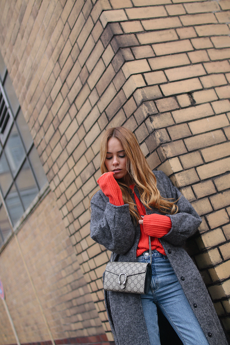 Fashion Essentials for Fall: Gucci Dionysus GG Supreme Mini bag, Saint Laurent ankle boots, Wool coat, Mom jeans, Red knit sweater