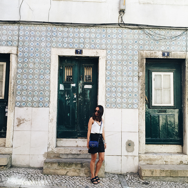 Nisi in front of Lisbon Building with pretty Tiles
